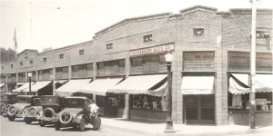 Exterior of shops along University Blvd., 1927